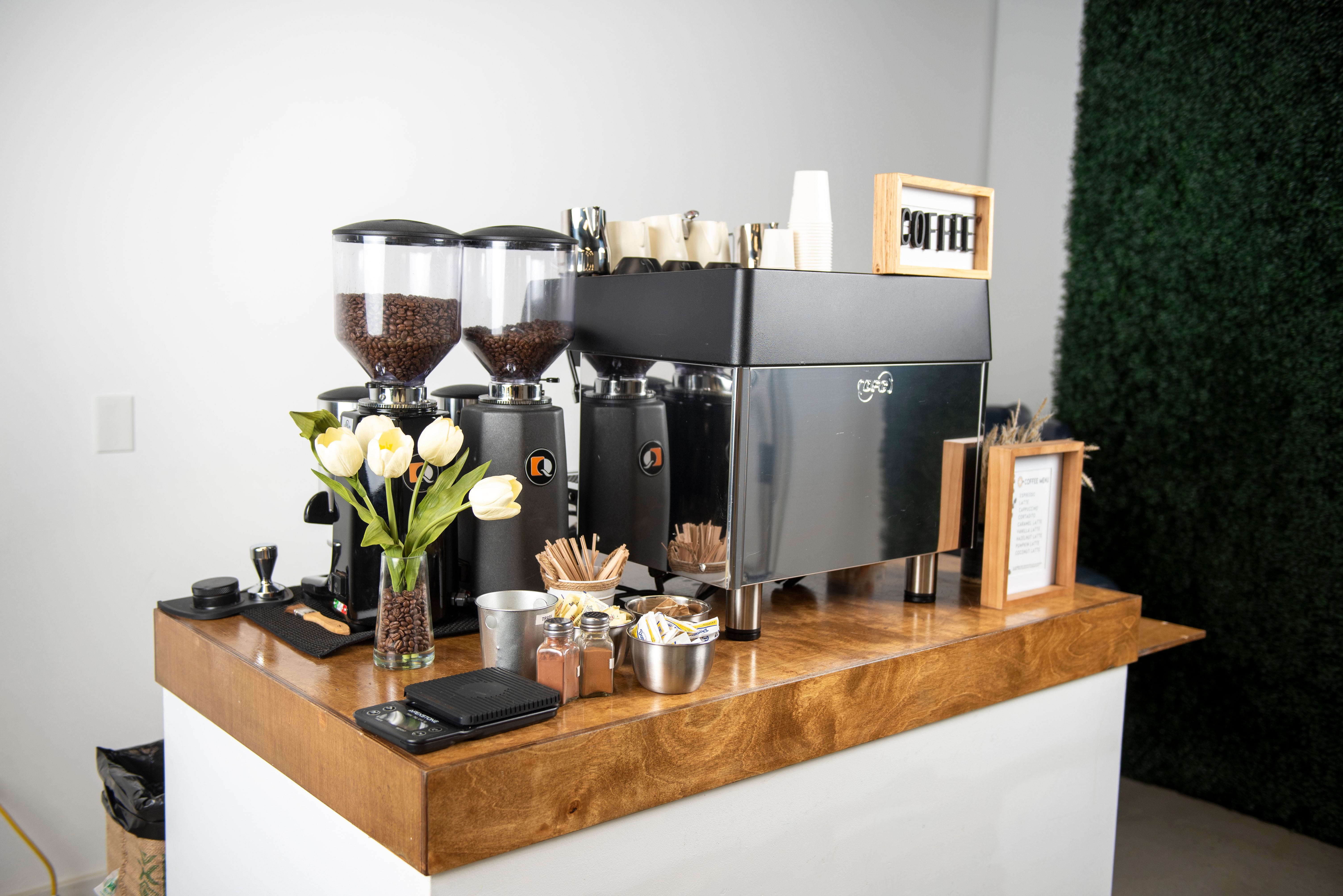 Complete professional coffee station setup with premium equipment and elegant presentation